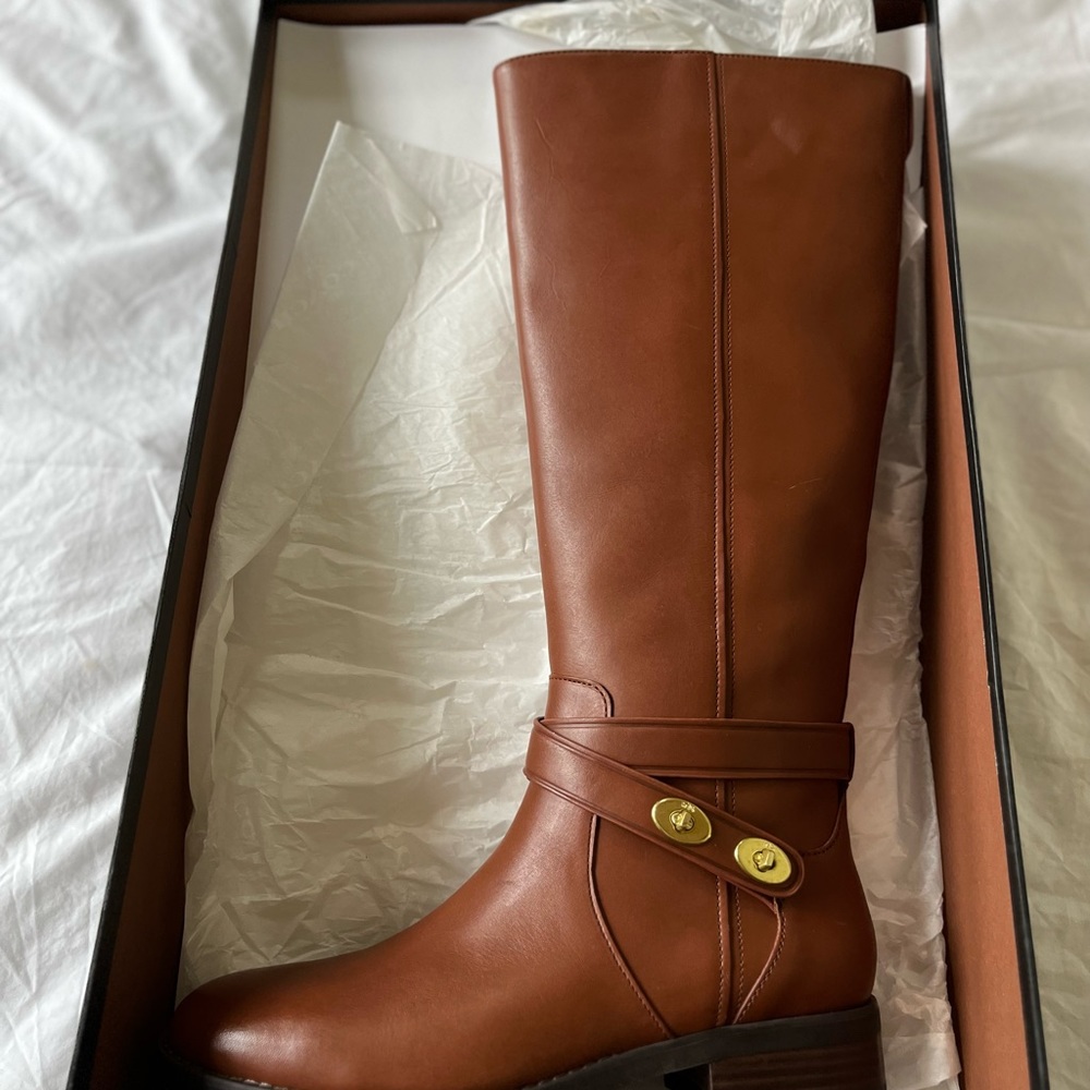 Brand new Coach Boots size 7.5 never worn, in box,